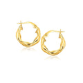 14K yellow gold hoop earrings in a 5/8 inch rounded tube profile