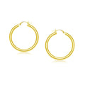 14K yellow gold polished hoop earrings, 25 mm, no stones