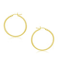 14K yellow gold polished 30 mm hoop earrings with no stones
