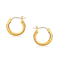 14K yellow gold diamond-cut hoop earrings with faceted diamond-cut detailing