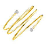 14K two-tone gold spiral bangle with round diamond stones thumbnail 1