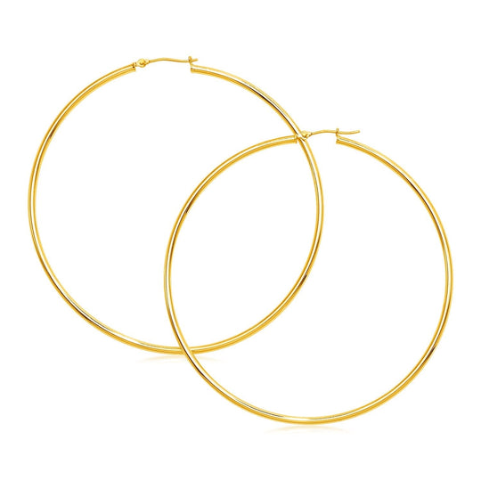 14K yellow gold large polished hoop earrings with no stones
