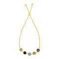 14K yellow gold bracelet with round multicolored gemstones