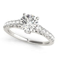14K white gold ring with single row of round diamond stones