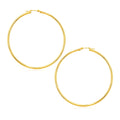 14K yellow gold large round hoop earrings with polished finish