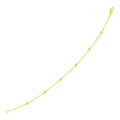 14K yellow gold bracelet with diamond stations along a fine chain